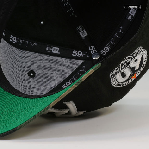 OAKLAND RAIDERS 60TH ANNIVERSARY RETRO SCRIPT GITD WOODLAND CAMO NEW ERA FITTED CAP