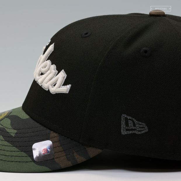 OAKLAND RAIDERS 60TH ANNIVERSARY RETRO SCRIPT GITD WOODLAND CAMO NEW ERA FITTED CAP