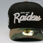 OAKLAND RAIDERS 60TH ANNIVERSARY RETRO SCRIPT GITD WOODLAND CAMO NEW ERA FITTED CAP