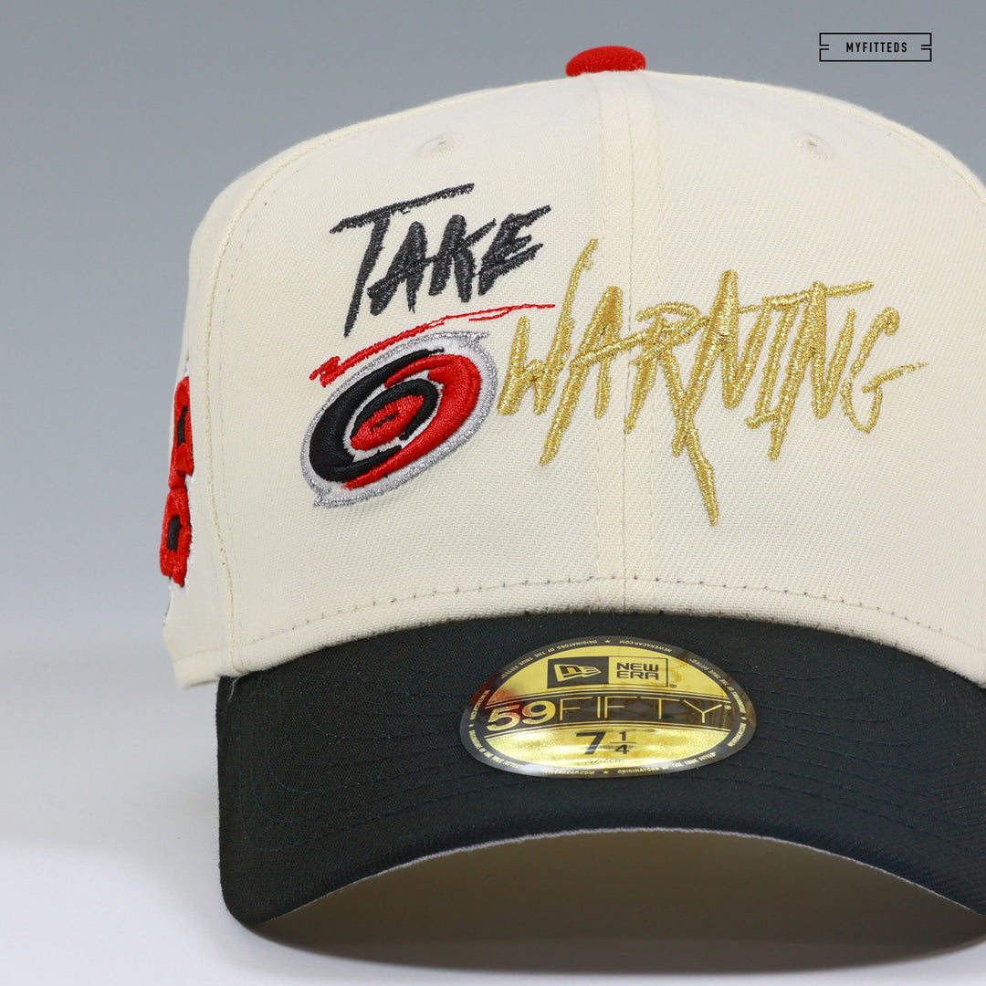 CAROLINA HURRICANES NHL TAKE WARNING OFF WHITE GITD NEW ERA FITTED