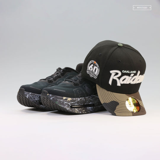 OAKLAND RAIDERS 60TH ANNIVERSARY RETRO SCRIPT GITD WOODLAND CAMO